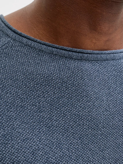 5616090